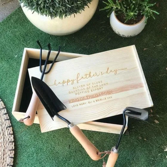 A Father's Day Engraved Wooden Garden Box Kit with gardening tools